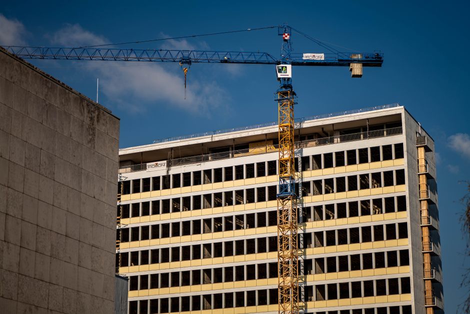 View of a construction crane and building facade in Zagreb, Croatia.