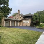 Drying Sealcoat Asphalt Driveway in Cleveland Heights.