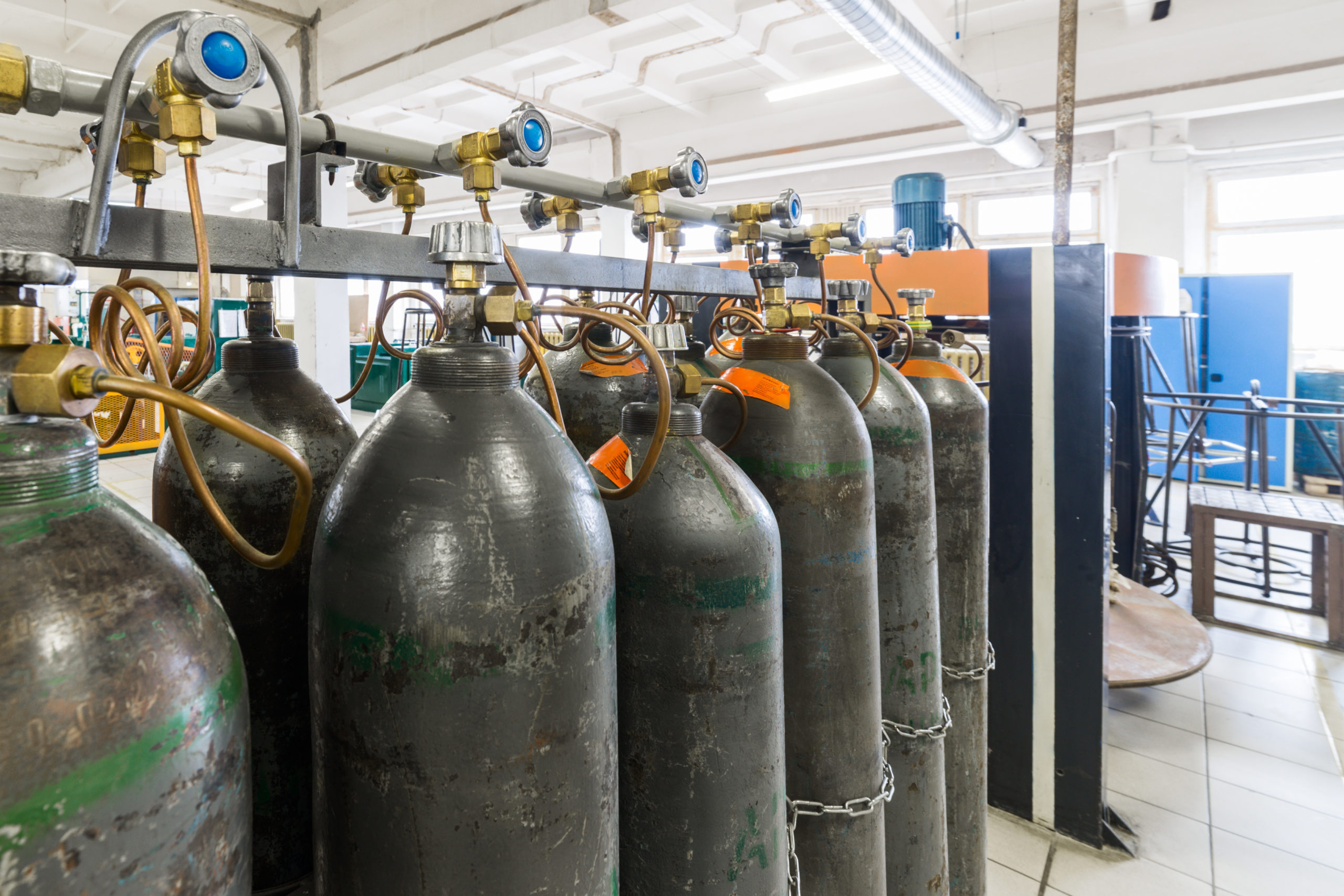 Rows of gray gas cylinders
