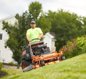 Man Mowing grass in lawn