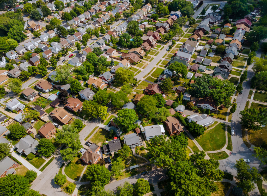 Wide panorama, aerial view with tall buildings, in the beautiful residential quarters and green streets Parma OH USA