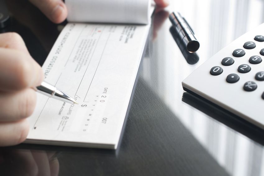 29945605 - business woman prepare writing a check