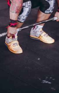 Right Footwear: weightlifting shoes