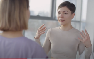 Two women talking
