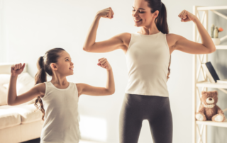 Mother and Daughter Flexing