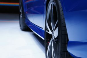 blue car with black wheels